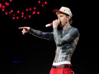 Machine Gun Kelly reveals scary unwanted side effects after protecting physique in 'close to not possible' blackout tattoos