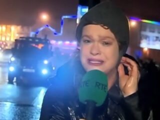 Old Edited Viral Video of Reporter Hit by Stop Sign Resurfaces as TikTok Trend After Dolly Parton's Death